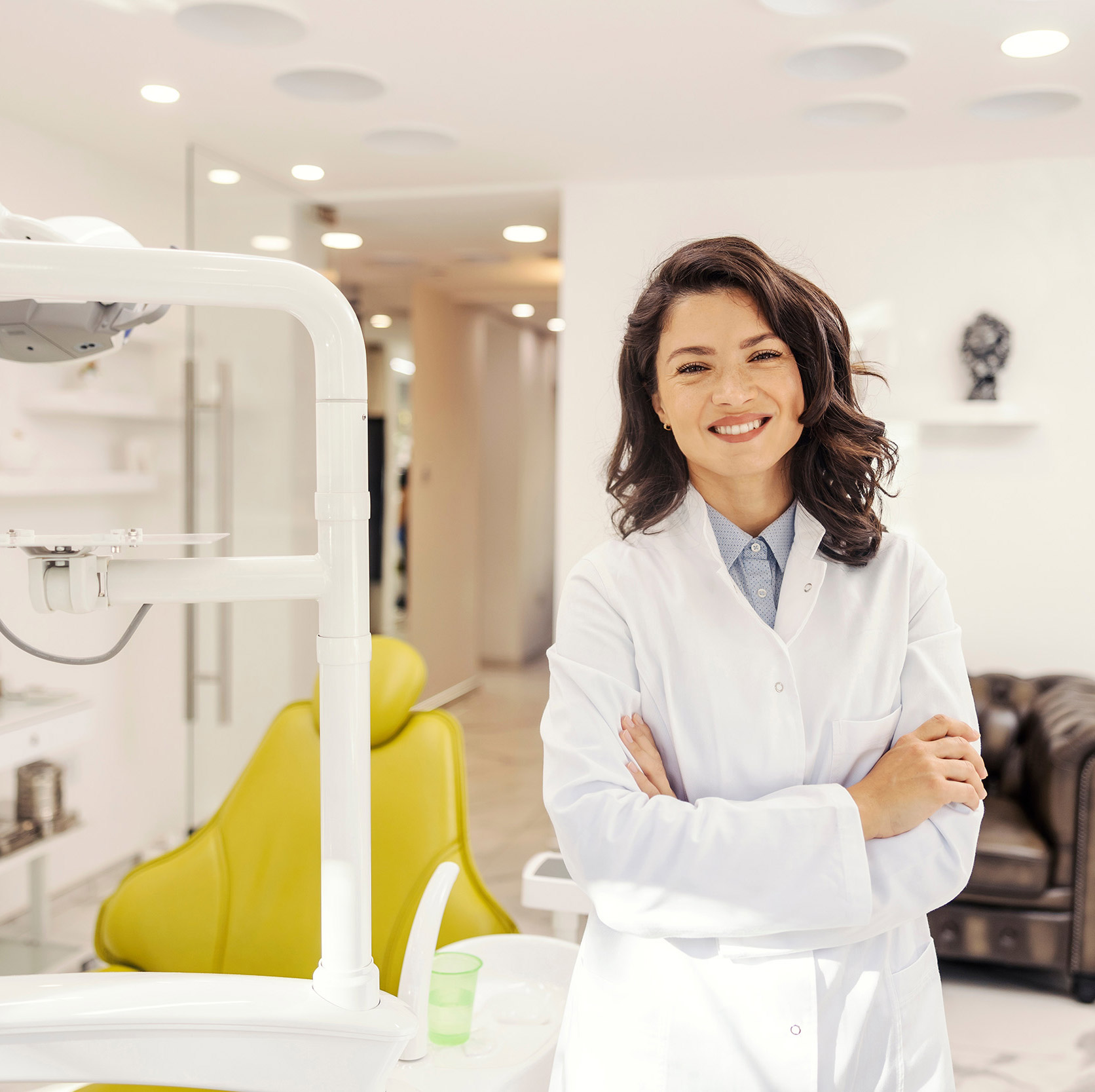 A dental principal at calm focus, the moment a monthly report lands